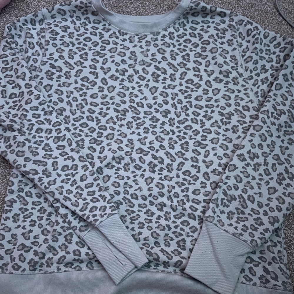 Woman’s cheetah print crew neck
